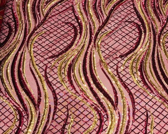 Burgundy/Gold sequin flame design on a 4 way stretch mesh-sold by the yard.