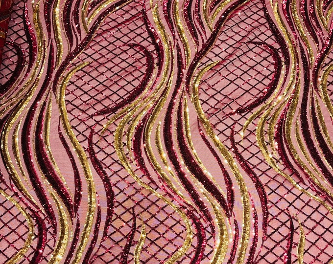 Burgundy/Gold sequin flame design on a 4 way stretch mesh-sold by the yard.