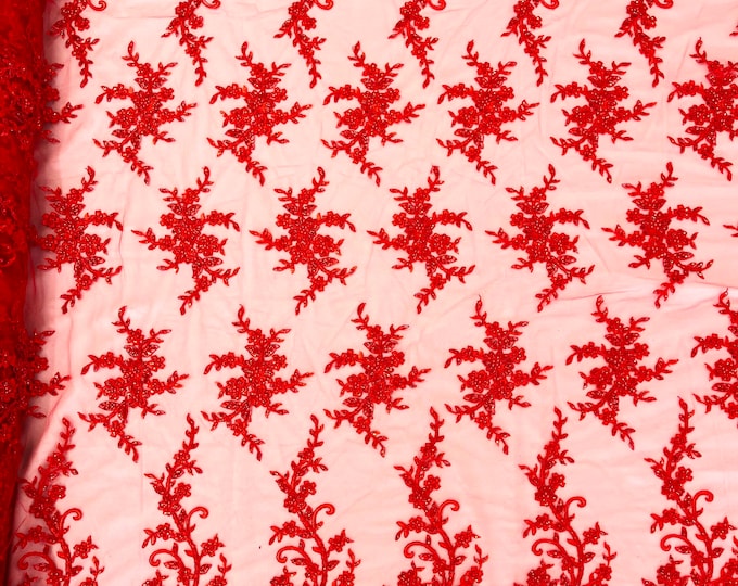 Red flowers embroider with sequins and heavy beaded on a mesh lace fabric-sold by the yard.