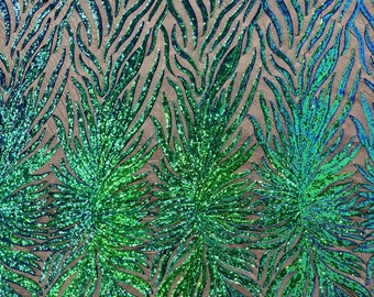 Green iridescent phoenix feather design with sequins embroider on a Black 4 way stretch mesh fabric-sold by the yard.