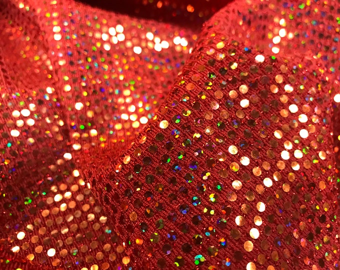 Red iridescent hologram round sequins on a metallic spandex-sold by the yard-free shipping in the usa.