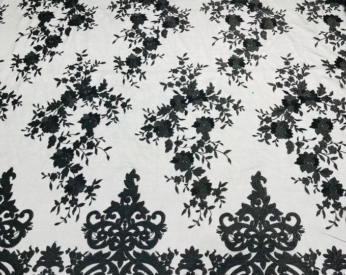 Black flowers flat lace embroider on a 2 way stretch mesh sold by the yard.