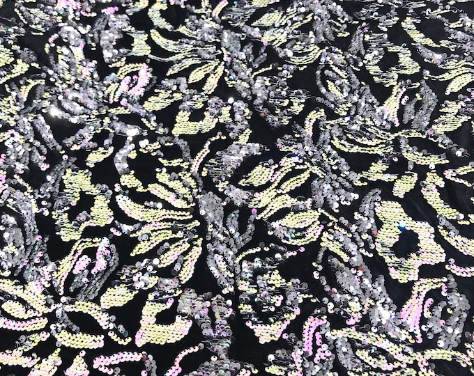 Pink, silver iridescent sequins flip two tone floral design on a black stretch velvet, Sold by the yard.