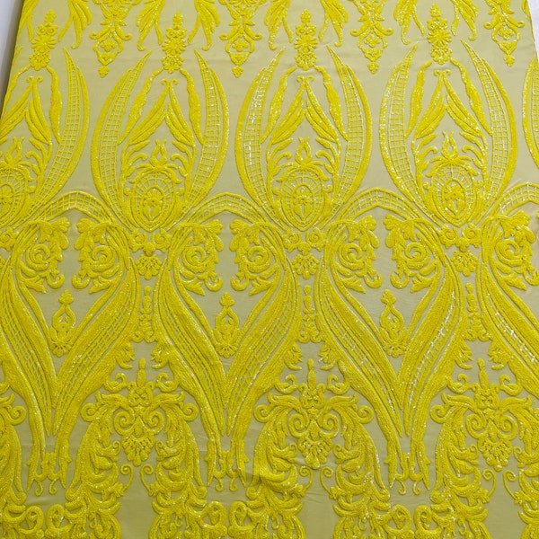 Empire damask design with sequins embroider on a Black 4 way stretch mesh fabric-sold by the yard. Yellow main image 0