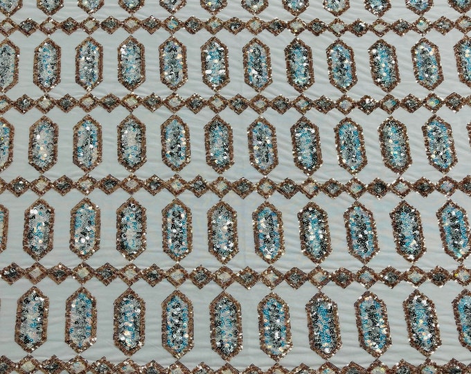 Aqua/Rose gold iridescent Jewel sequin design on a white 4 way stretch mesh fabric -sold by the yard.
