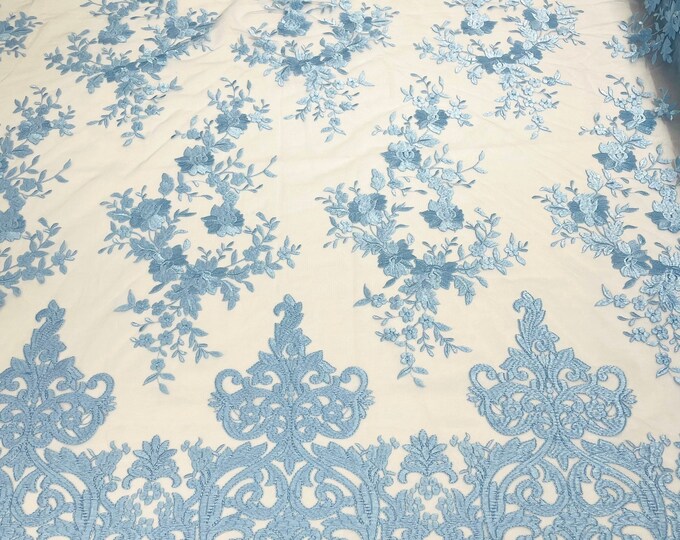 Light Blue flowers flat lace embroider on a 2 way stretch mesh sold by the yard.