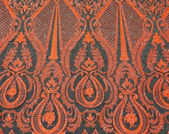 Neon orange princess design iridescent sequins embroidery on a 4 way stretch black mesh-dresses-apparel-prom-nightgown-sold by the yard.