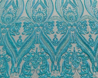 Mint aqua iridescent empire damask design with sequins embroider on a mint 4 way stretch mesh fabric-sold by the yard.