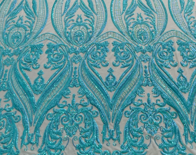 Mint aqua iridescent empire damask design with sequins embroider on a mint 4 way stretch mesh fabric-sold by the yard.