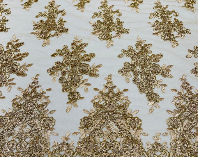 Metallic champagne flower lace corded and embroider with sequins on a mesh-Sold by the yard.
