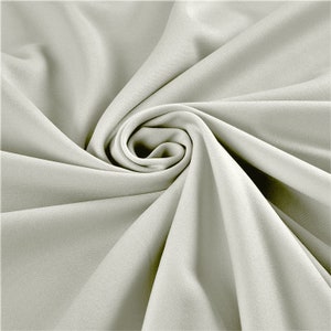 Ivory 59/60&quot; Wide 100% Polyester Wrinkle Free Stretch Double Knit Scuba Fabric Sold By The Yard.