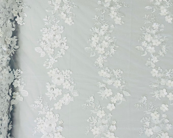 White Diana 3d floral design embroider with pearls in a mesh lace-sold by the yard.