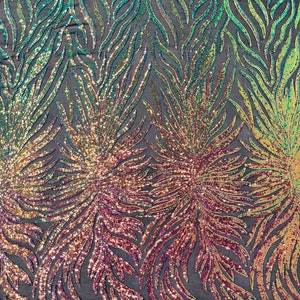 Aqua clear iridescent phoenix feather design with sequins embroider on a Black 4 way stretch mesh fabric-sold by the yard.