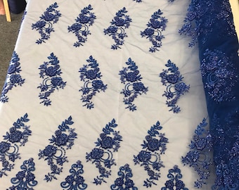 Royal blue hand beaded floral design embroidery with shiny sequins on a mesh lace-dresses-apparel-fashion-prom-nightgown-sold by the yard.