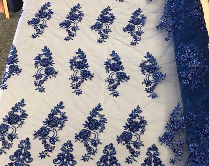 Royal blue hand beaded floral design embroidery with shiny sequins on a mesh lace-dresses-apparel-fashion-prom-nightgown-sold by the yard.