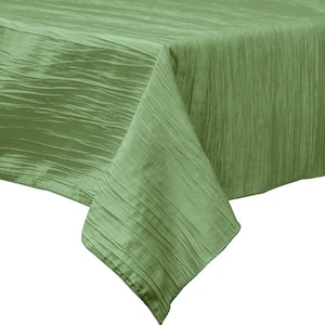 May include: A green tablecloth with a crinkled texture. The tablecloth is made of a soft, silky material and has a subtle sheen.
