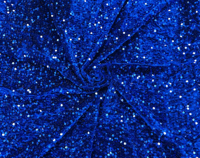 Royal Blue economic all over shiny sequins on a 2 way stretch velvet , sold by the yard.
