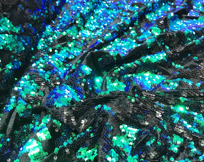 Green/Purple/Black iridescent sequins flip two tone camouflage  design on a black stretch velvet, Sold by the yard.