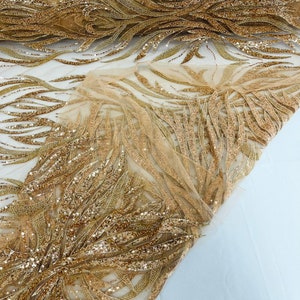 Elegant hand beaded design embroider on a glitter mesh lace-prom-sold by the yard. Rose Gold main image 1