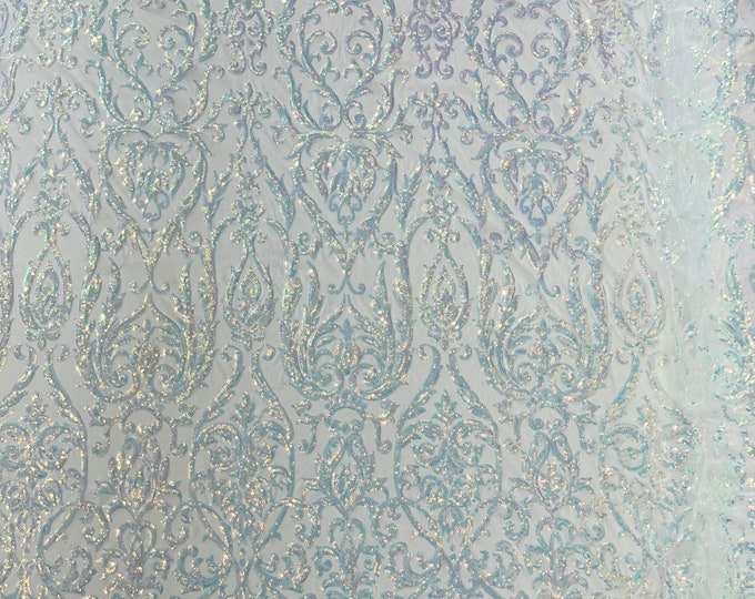 Aqua Clear Iridescent King Damask sequin design on a White 4 way stretch mesh fabric-prom-sold by the yard.