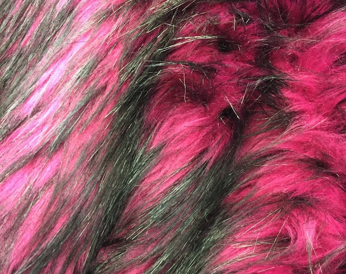 Magenta/black husky faux fur, 2 tone shaggy faux fur. Sold by the yard.60" wide.