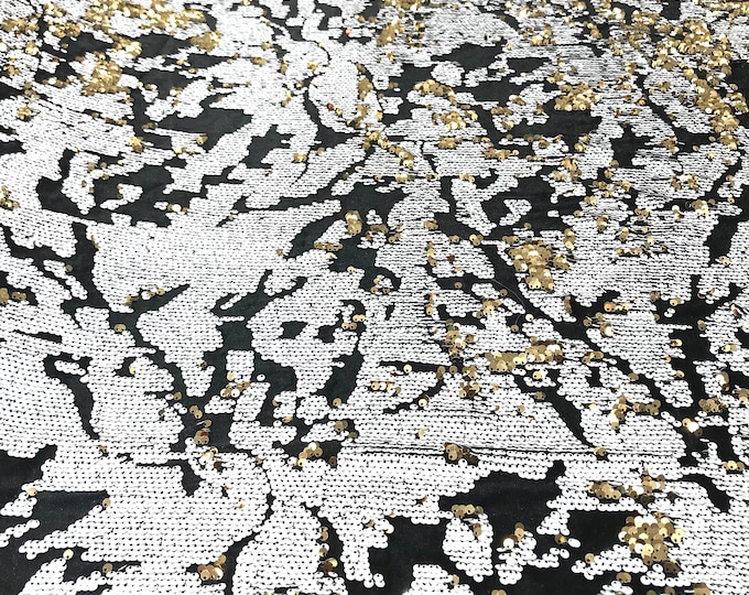 Gold/ White sequins flip two tone camouflage  design on a black stretch velvet, Sold by the yard.