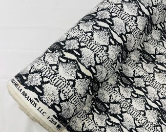 Black/White python snake print on a cotton canvas/58” wide/sold by the yard.