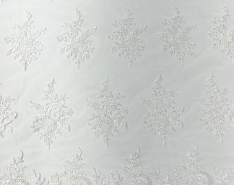 Ivory floral corded embroider with sequins on a mesh lace fabric-prom-sold by the yard.