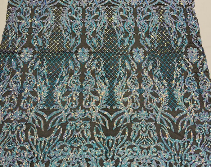 clear blue iridescent shiny sequin damask design on a black 4 way stretch mesh-prom-nightgown-sold by the yard-free shipping in the usa.