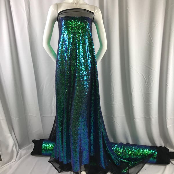 Green/purple iridescent mermaid fish scales-mini sequins embroider on a black mesh fabric-fashion-decorations-dresses-sold by the yard-