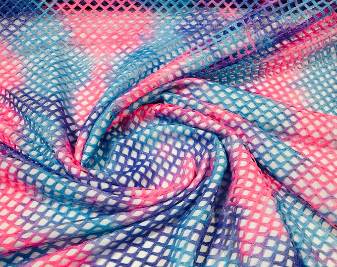Hot Pink/Lilac big fishnet diamond mesh tie dye with silver glitter 4 way stretch 58/60 inches wide. Sold by the yard.