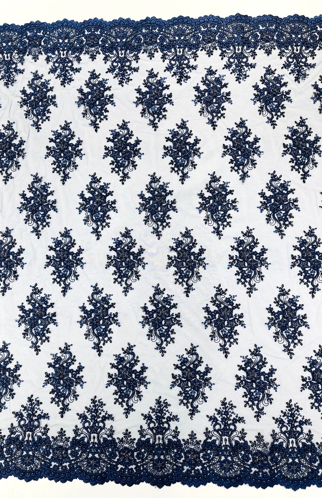 NAVY BLUE FLORAL DESIGN WITH CORD EMBROIDERY ON A MESH LACE-SOLD BY YARD. main image 1