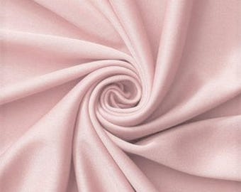 Lichtroze stof, polyester spandex interlockgebreid met mechanische stretch