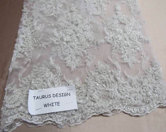 Gorgeous white French design embroider and beaded on a mesh lace. Wedding/Bridal/Prom/Nightgown fabric.