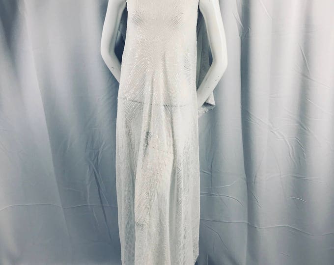 White geometric diamond design embroider with sequins on a 2 way stretch mesh lace-dresses-fashion-nightgown-prom-sold by yard.