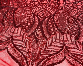 Red royalty sequin design on a 4 way stretch mesh-prom-sold by the yard.