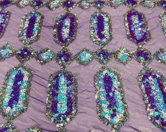 Lavender iridescent Jewel sequin design on a 4 way stretch mesh fabric -sold by the yard.