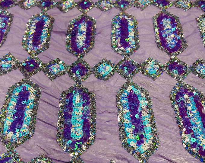 Lavender iridescent Jewel sequin design on a 4 way stretch mesh fabric -sold by the yard.