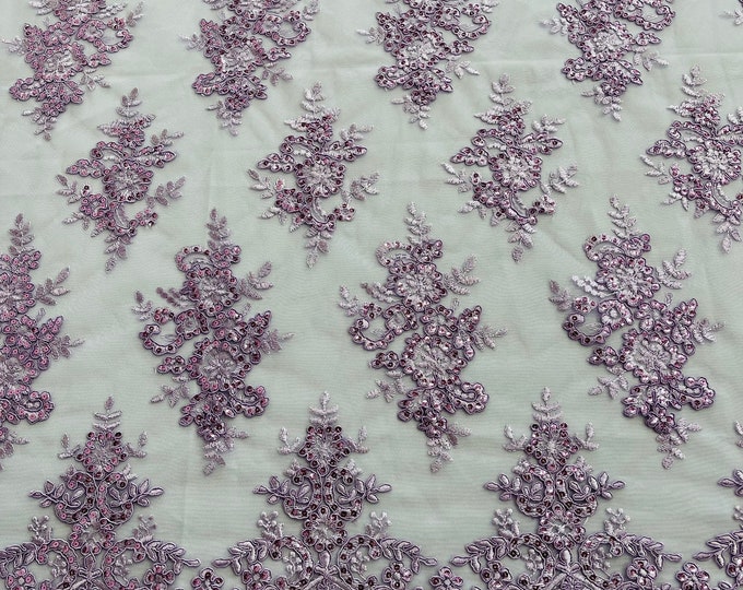 Lilac flower lace corded and embroider with sequins on a mesh fabric- Sold by the yard.