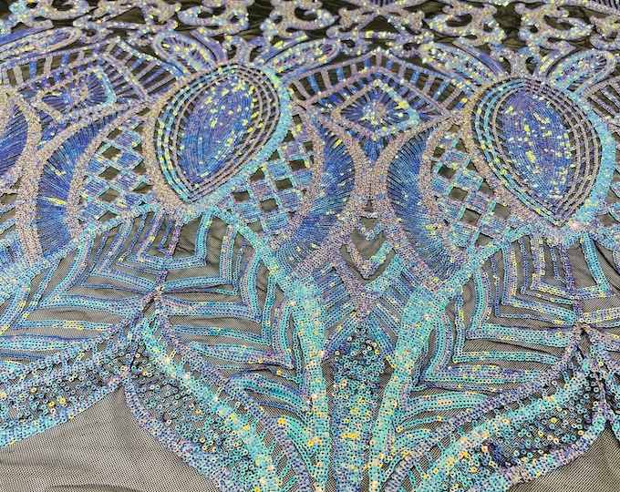 Aqua blue iridescent royalty sequin design on a black 4 way stretch mesh-prom-sold by the yard.