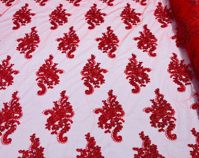 Red metallic floral design embroidery on a mesh lace with sequins and cord-sold by the yard.