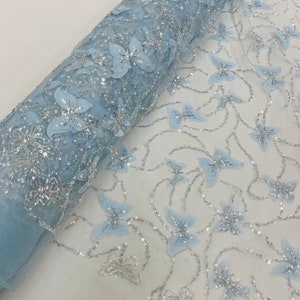 Wings Design Embroider and heavy beading on a mesh lace-sold by the yard. Blush
