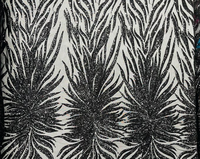 Black - Phoenix feather design with sequins embroider on a Black 4 way stretch mesh fabric-sold by the yard.