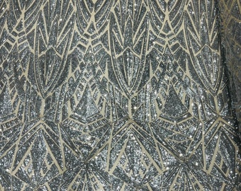 Silver Geometric shiny sequin design on a Nude 4 way stretch mesh-sold by the yard.