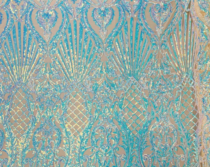 Aqua iridescent sequin shell damask design on a nude 4 way stretch mesh fabric -prom-sold by the yard.