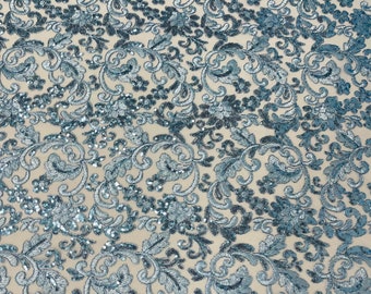 Light blue metallic corded embroider flowers with sequins on a mesh lace fabric-prom-sold by the yard.