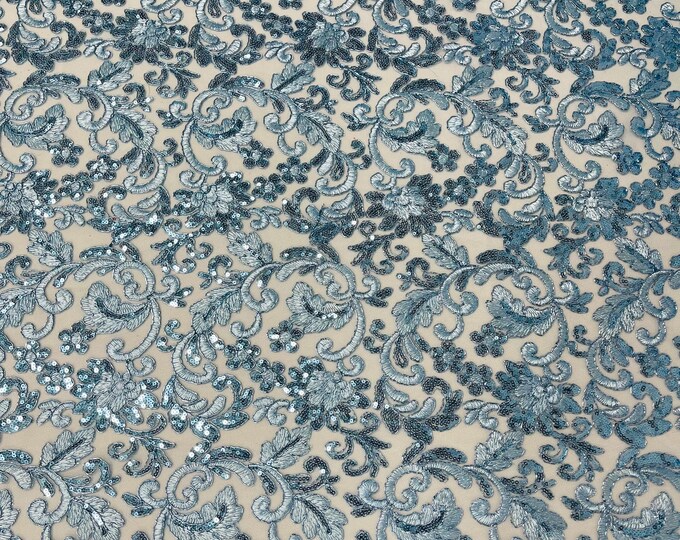 Light blue metallic corded embroider flowers with sequins on a mesh lace fabric-prom-sold by the yard.