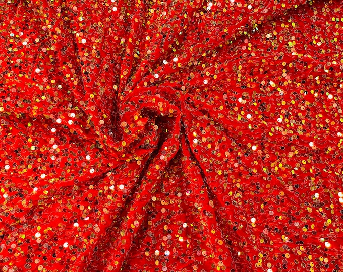 Clear Iridescent economic all over shiny sequins on a 2 way stretch Red velvet , sold by the yard.