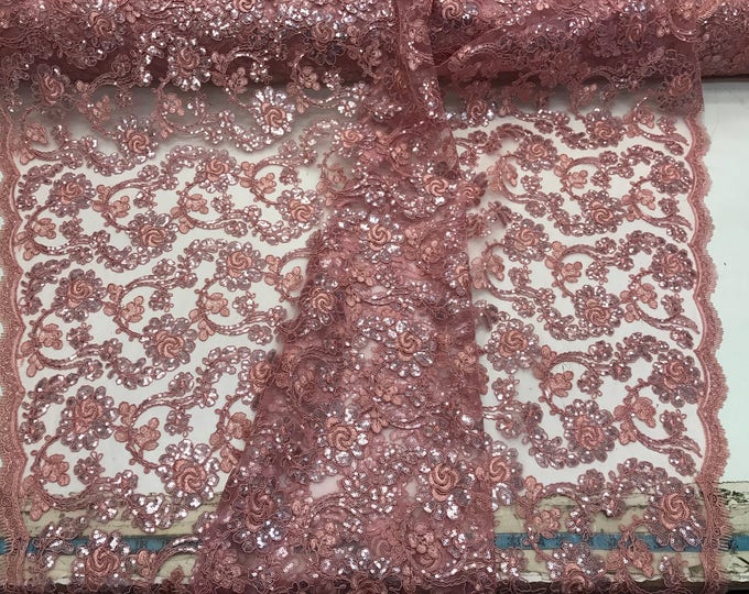 Dusty rose flowers embroider with sequins and corded on a mesh lace-wedding-bridal-prom-nightgown-decorations-sold by the yard.