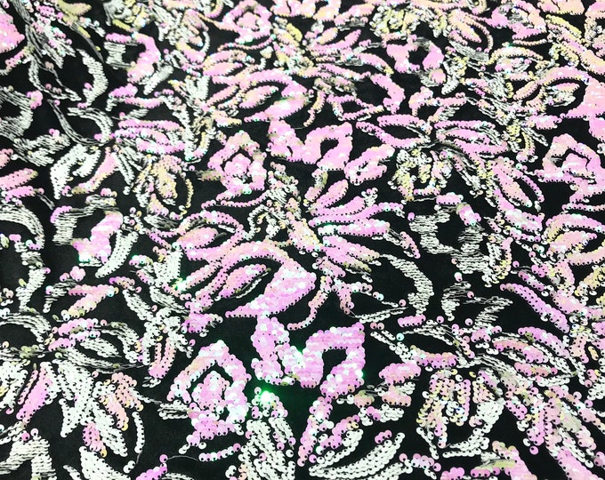 Pink, white iridescent sequins flip two tone floral design on a black stretch velvet, Sold by the yard.